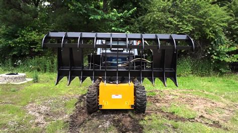 skid steer rock rake bobcat|bobcat rake attachment.